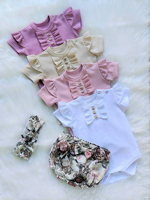 Renia Bambarillo Body z krótkim rękawem różowy