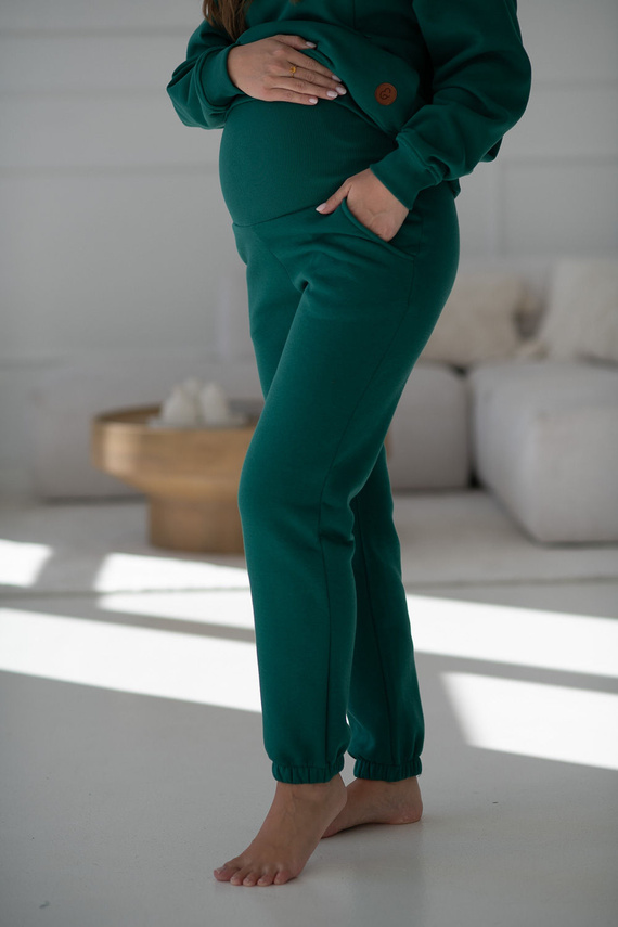 Motherhood Spodnie ciążowe Milk&Love butelkowa zieleń– gruba dzianina, elastyczny pas, bawełna z poliestrem, Oeko-Tex